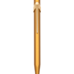 Caran Dache 849 Fluorescent Gold Ball Point Pen With Box {WP31989}