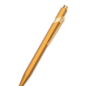 Caran Dache 849 Fluorescent Gold Ball Point Pen With Box {WP31989}