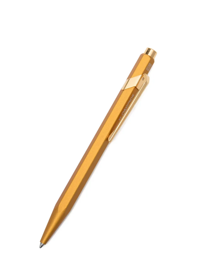 Caran Dache 849 Fluorescent Gold Ball Point Pen With Box {WP31989}